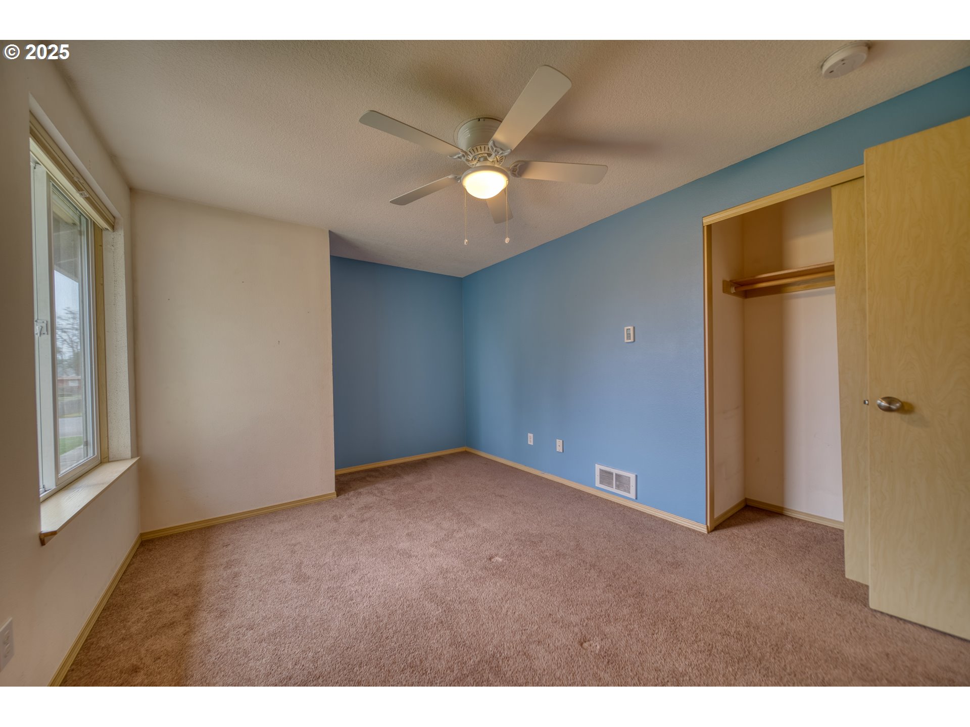34122 Adison Street Scappoose, OR 97056 - Photo 24 of 41 a view of an empty room with a ceiling fan