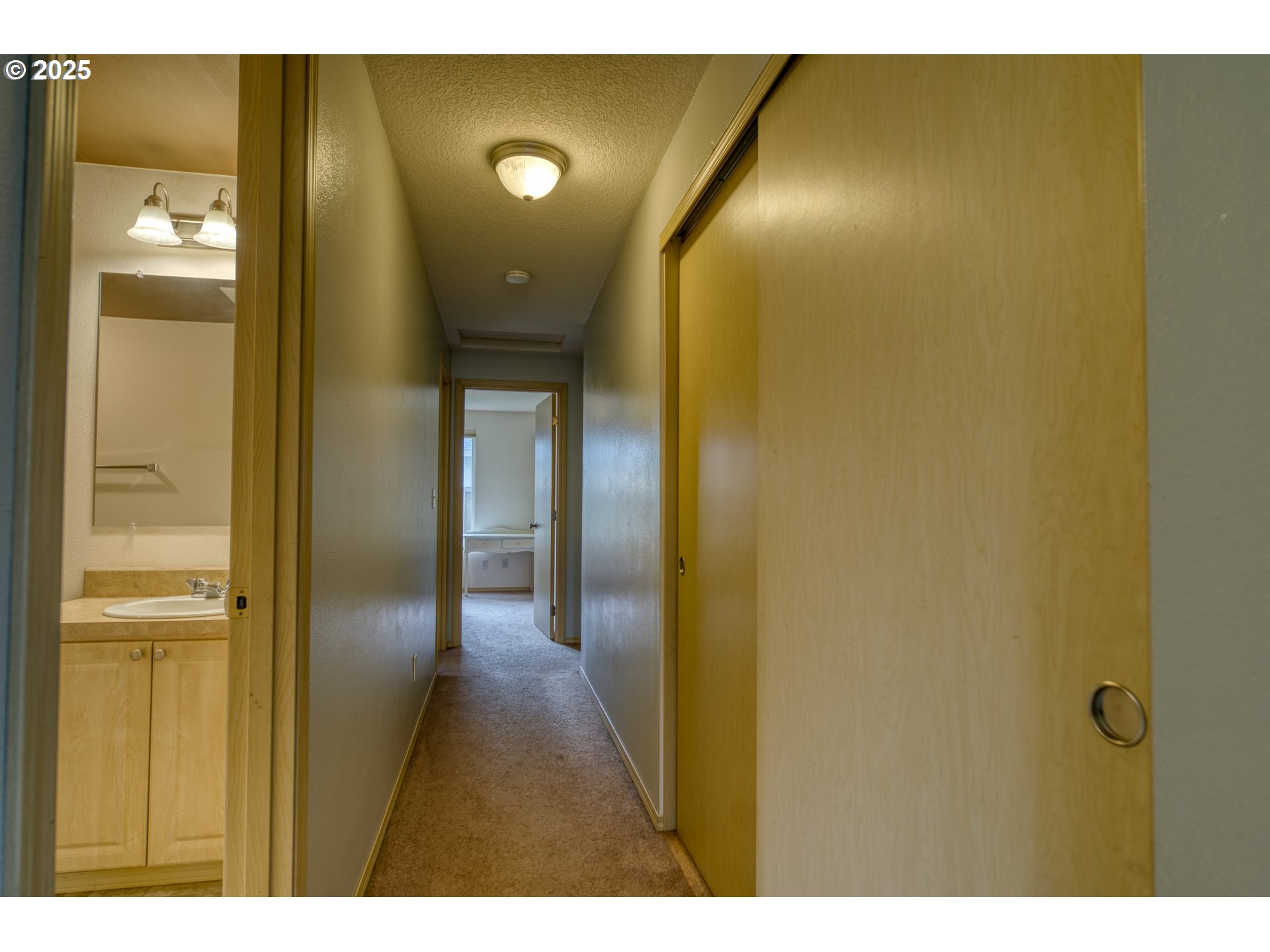 34122 Adison Street Scappoose, OR 97056 - Photo 25 of 41 a view of a bathroom with a door
