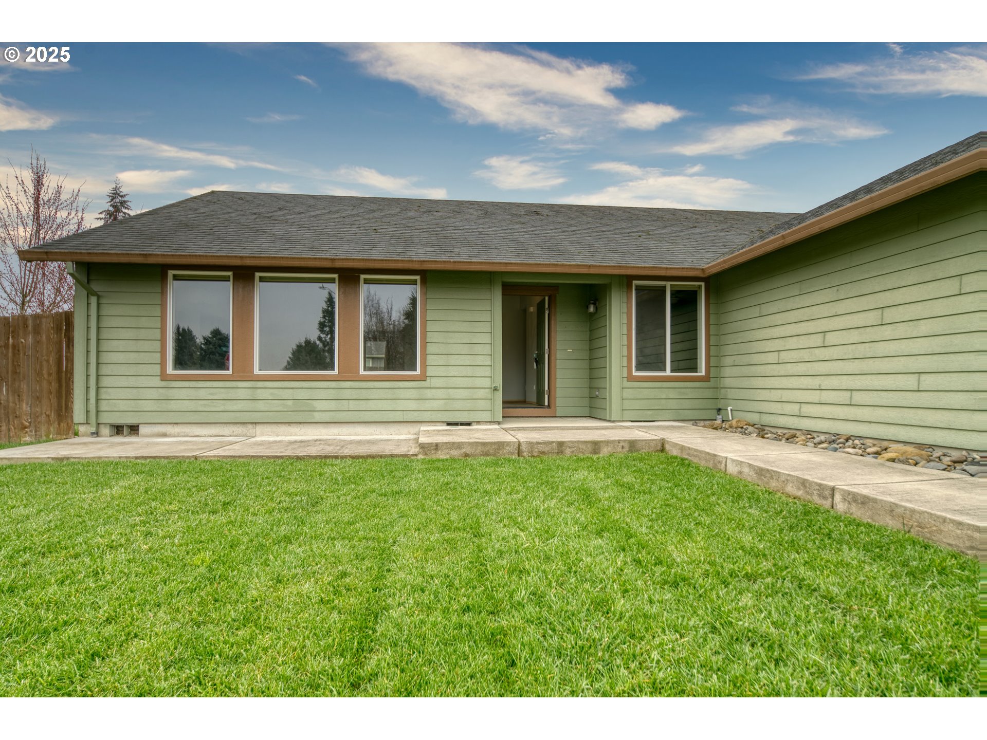 34122 Adison Street Scappoose, OR 97056 - Photo 3 of 41 a house with a yard