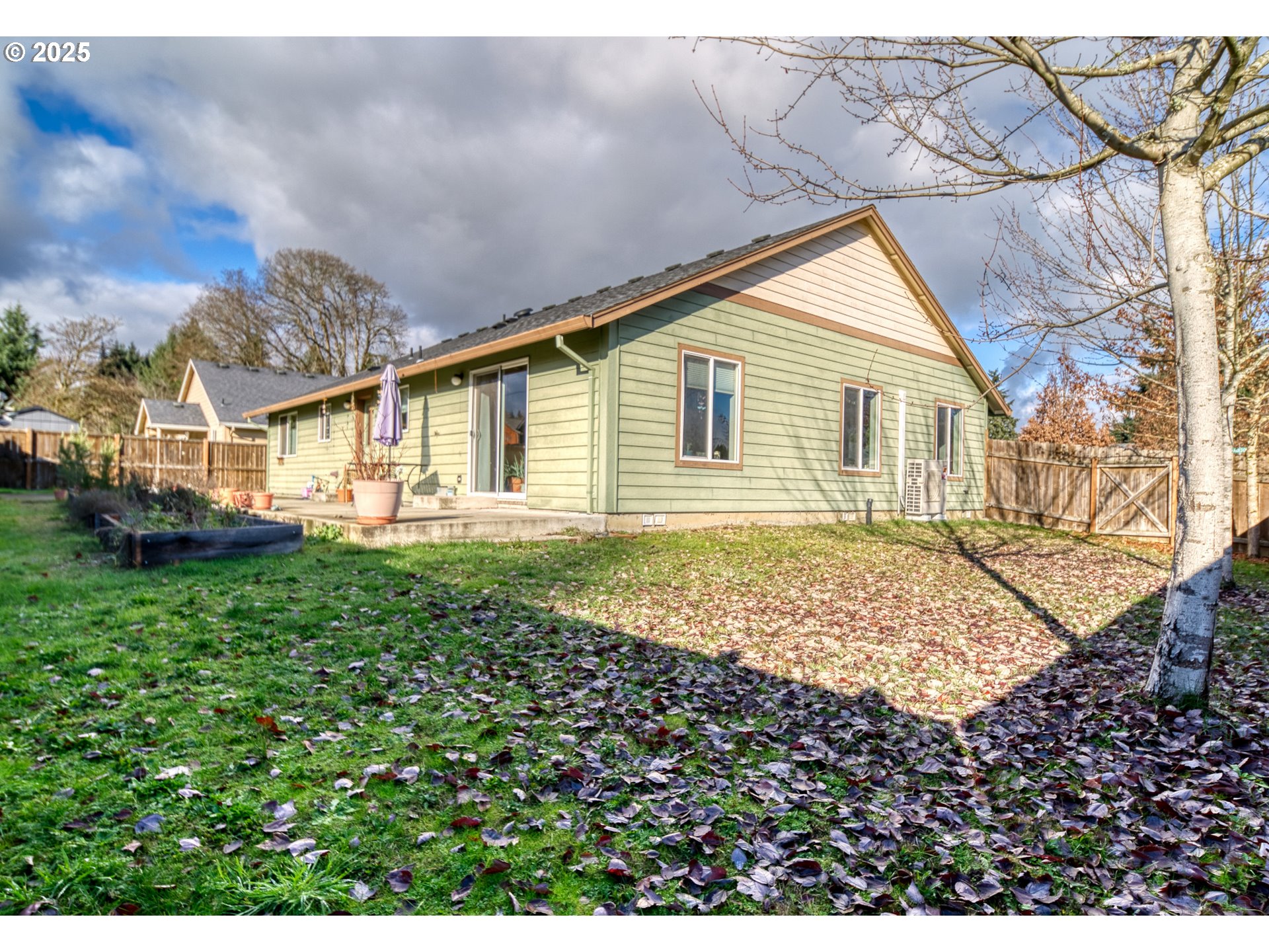 34122 Adison Street Scappoose, OR 97056 - Photo 38 of 41 a view of a house with a backyard