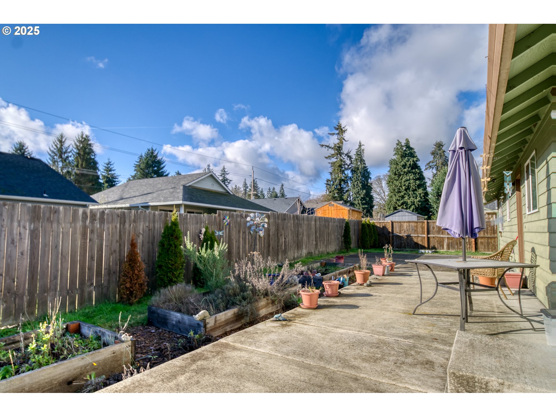 34122 Adison Street Scappoose, OR 97056 - Photo 40 of 41 a view of a backyard with sitting area