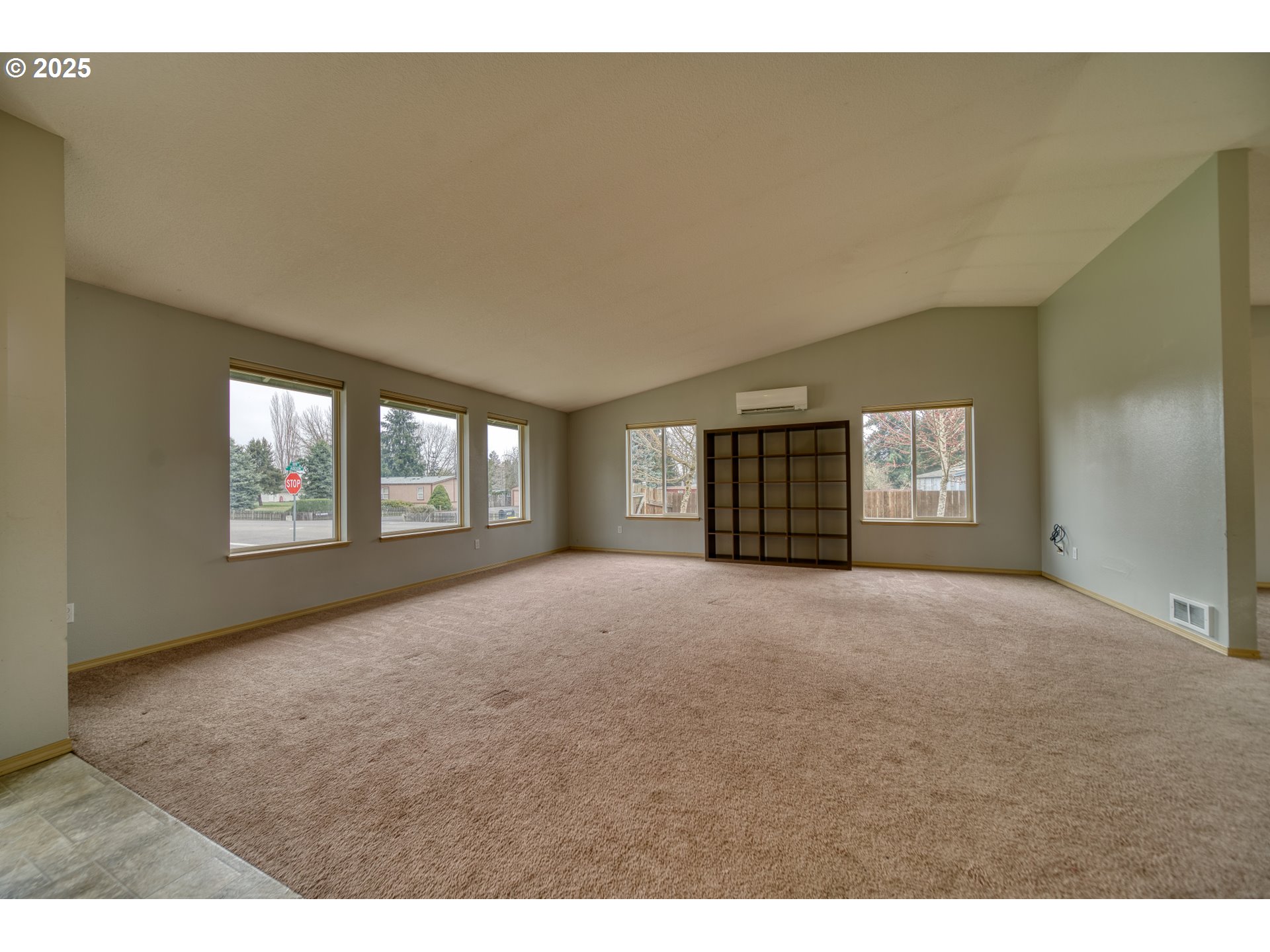 34122 Adison Street Scappoose, OR 97056 - Photo 4 of 41 a view of an empty room with a window