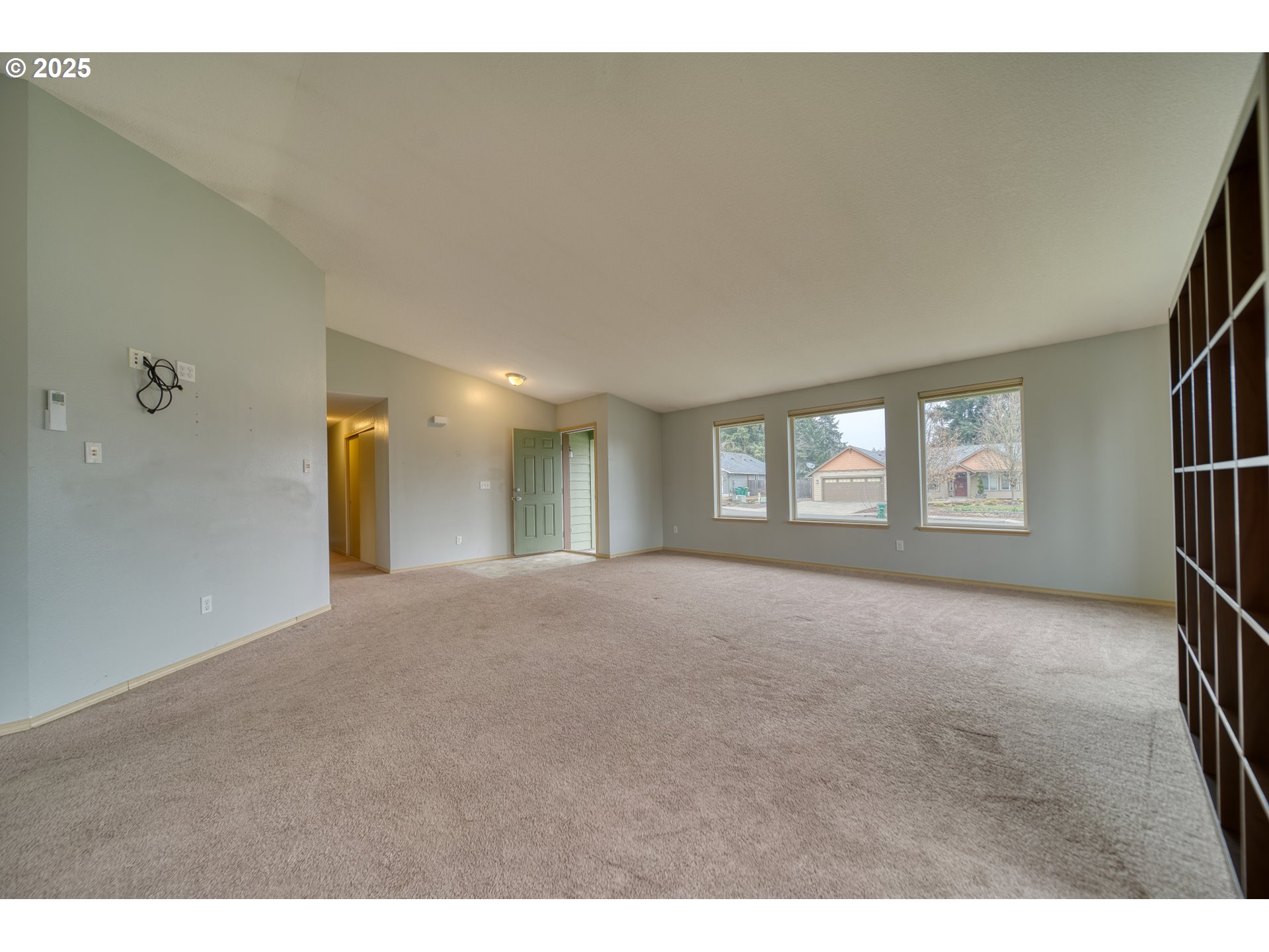 34122 Adison Street Scappoose, OR 97056 - Photo 5 of 41 a view of a livingroom and a fireplace