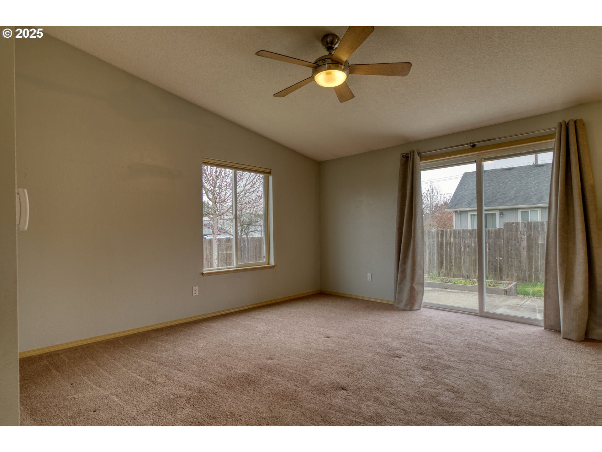 34122 Adison Street Scappoose, OR 97056 - Photo 7 of 41 a view of an empty room with a window