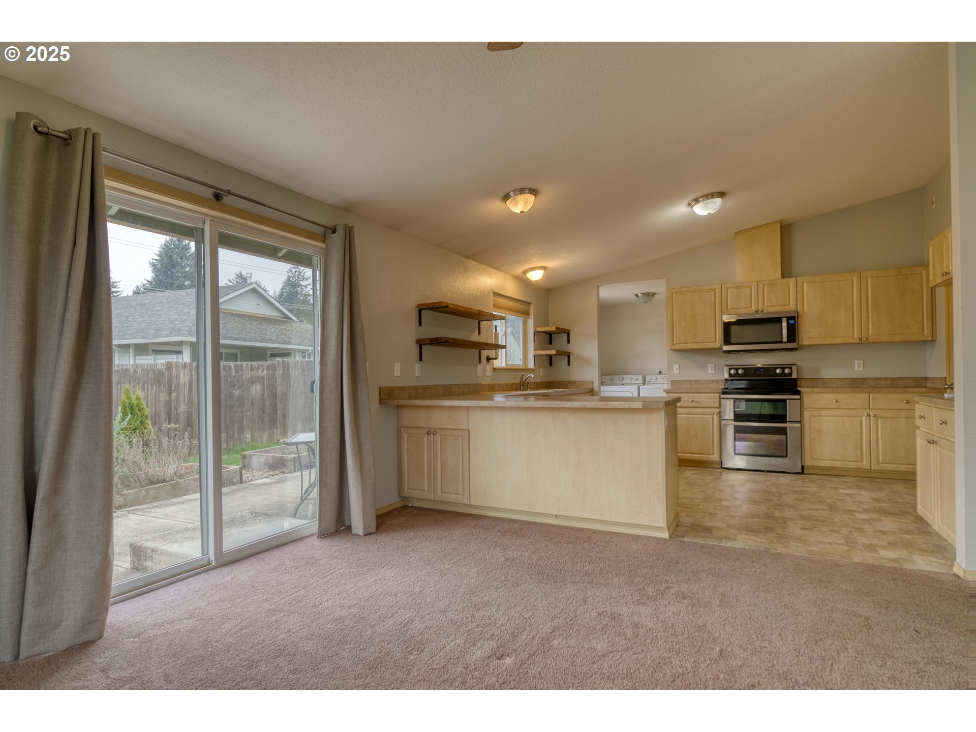 34122 Adison Street Scappoose, OR 97056 - Photo 8 of 41 a view of kitchen with wooden floor
