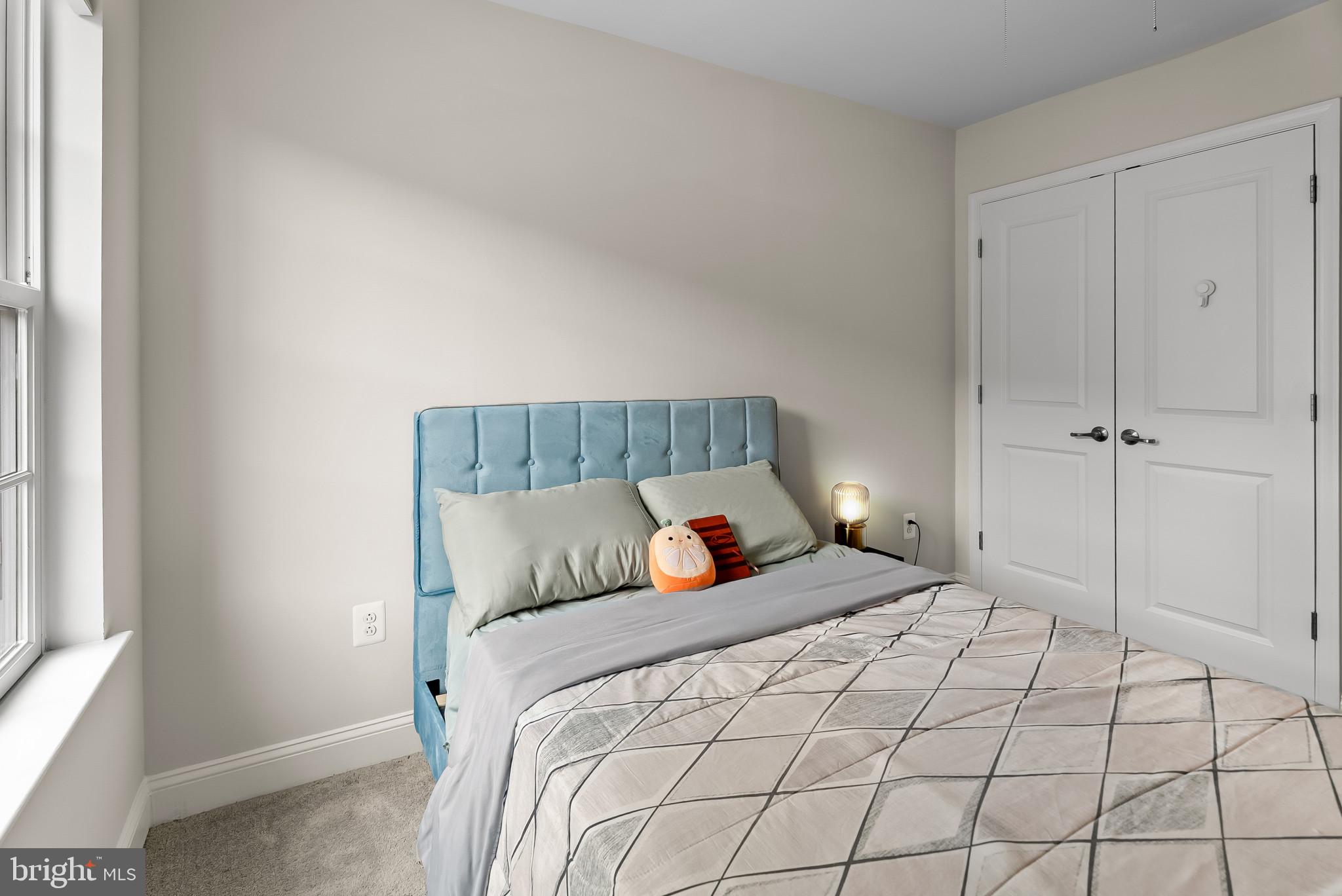 7202 Conley Alley Sykesville, MD 21784 - Photo 13 of 24 a bedroom with a bed and a window