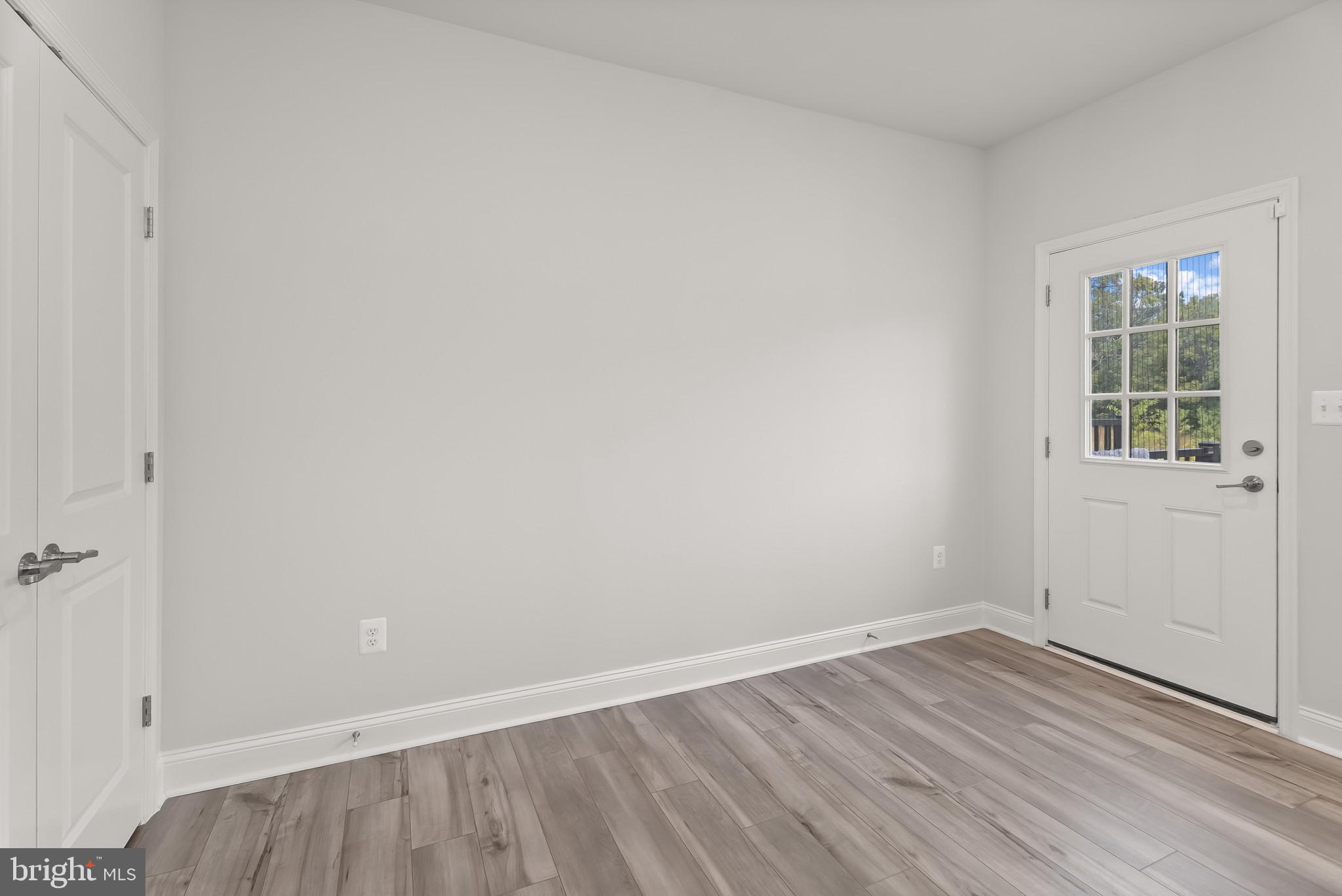 7202 Conley Alley Sykesville, MD 21784 - Photo 17 of 24 wooden floor in an empty room