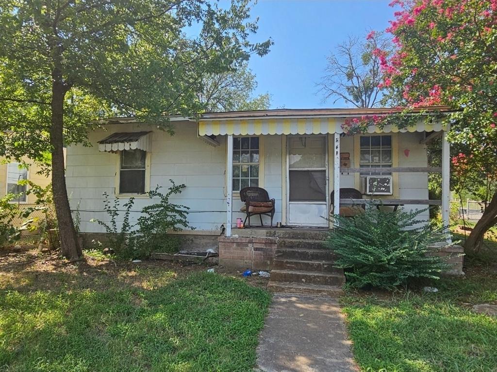 3500 Baylor Street Fort Worth, TX 76119 - Photo 1 of 16 front view of a house with a yard