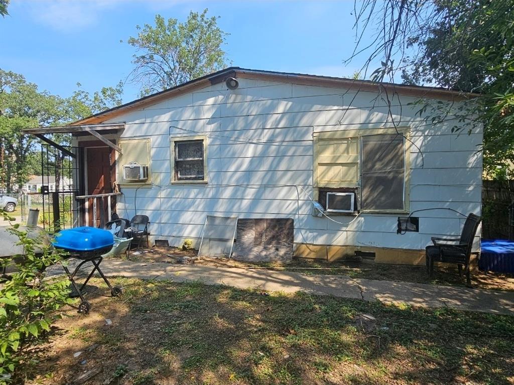 3500 Baylor Street Fort Worth, TX 76119 - Photo 15 of 16 a backyard of a house with outdoor seating