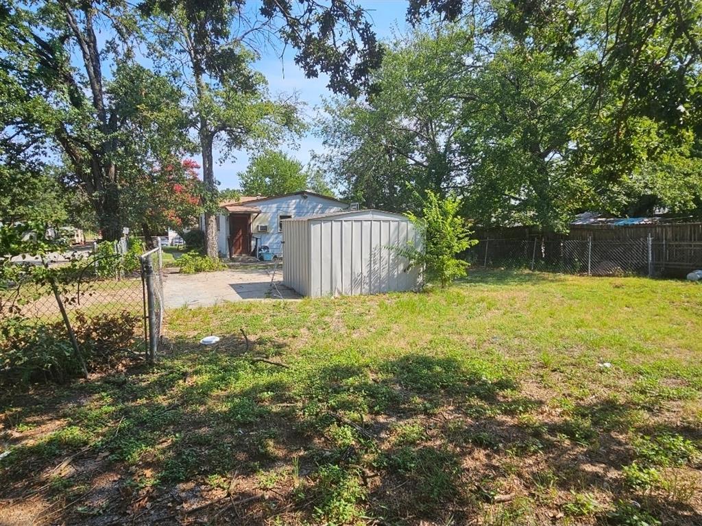 3500 Baylor Street Fort Worth, TX 76119 - Photo 16 of 16 a swimming pool with outdoor seating and yard