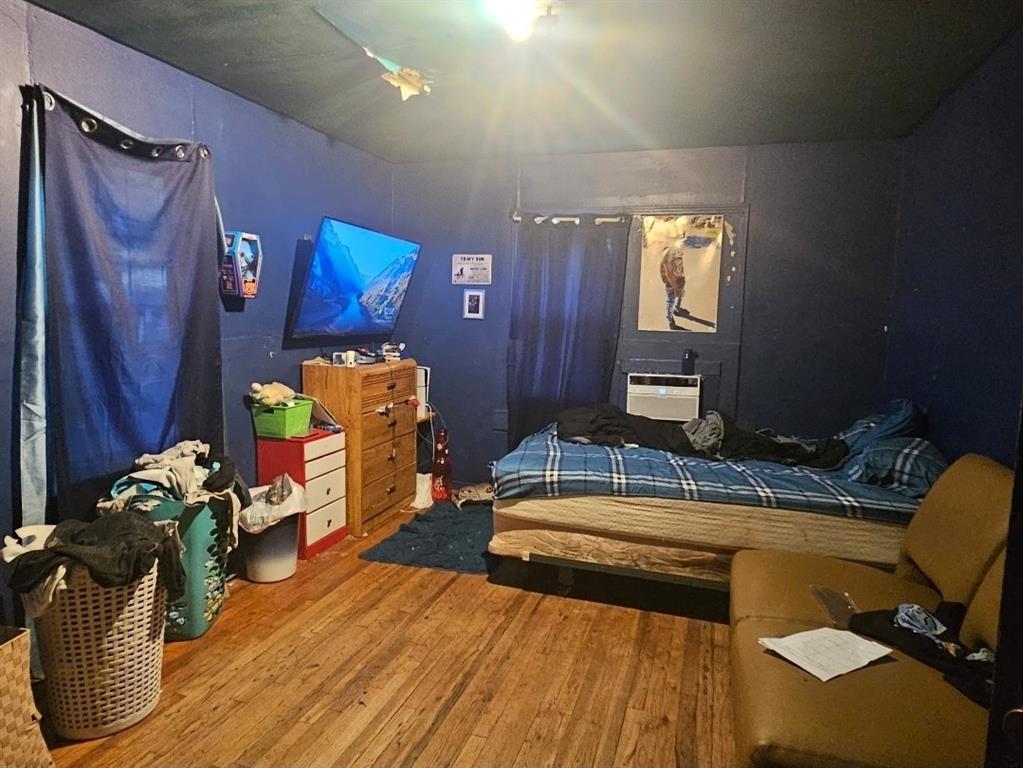 3500 Baylor Street Fort Worth, TX 76119 - Photo 10 of 16 a room with furniture and wooden floor