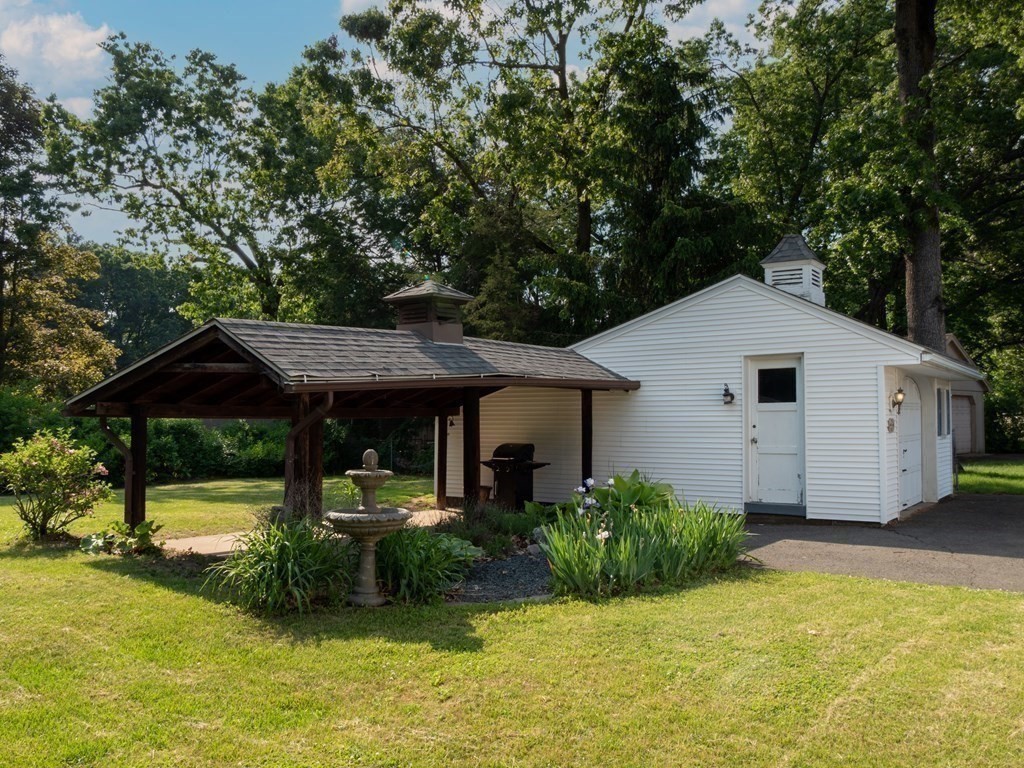 357 Massachusetts Avenue West Springfield, MA 01089 - Photo 18 of 22 a house view with a garden space