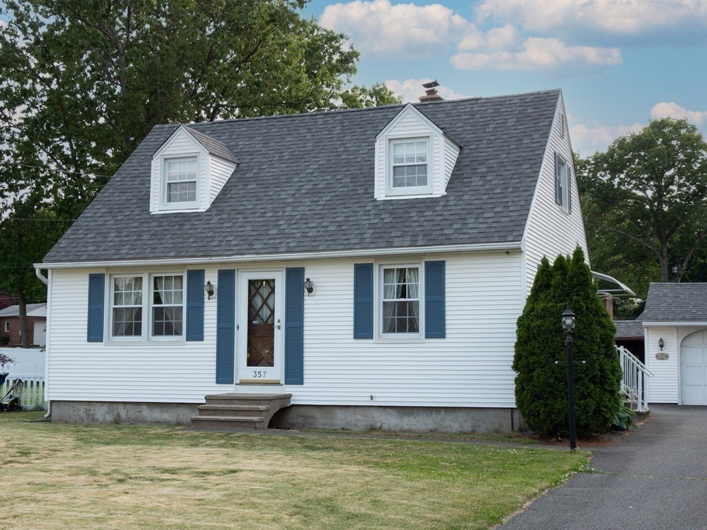 357 Massachusetts Avenue West Springfield, MA 01089 - Photo 19 of 22 a house that has a large pool in front of it