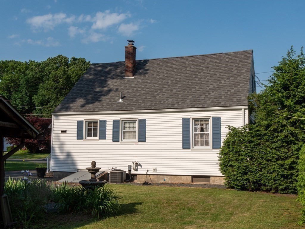 357 Massachusetts Avenue West Springfield, MA 01089 - Photo 22 of 22 a front view of a house with a yard