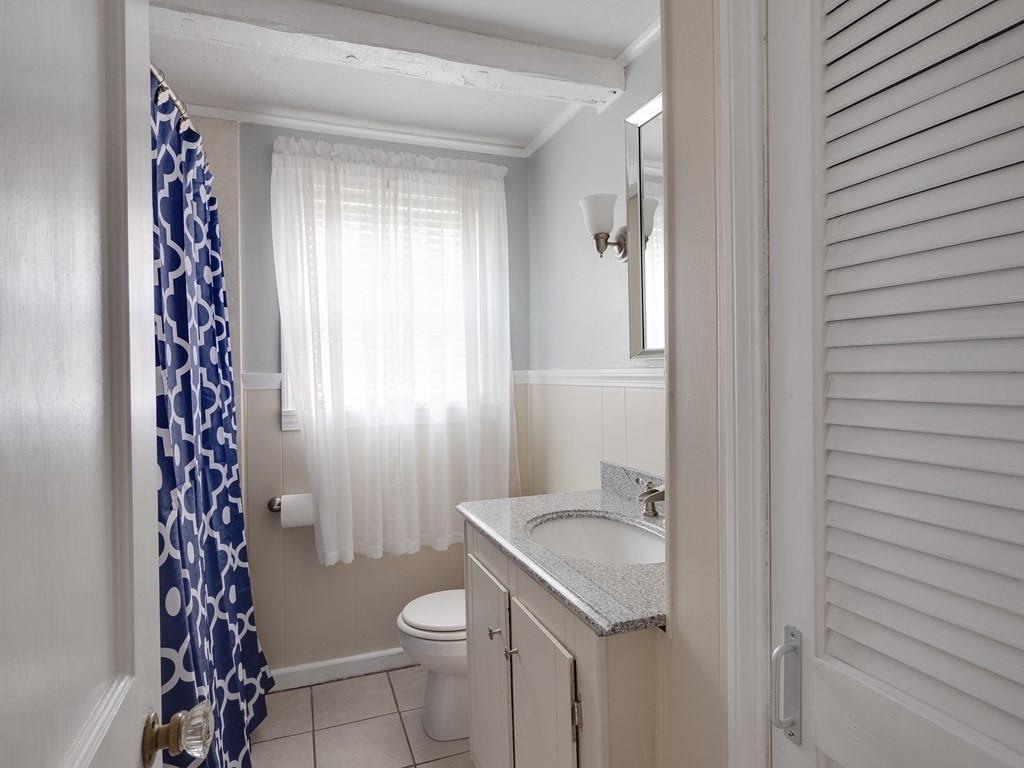 357 Massachusetts Avenue West Springfield, MA 01089 - Photo 4 of 22 a bathroom with a sink toilet and shower