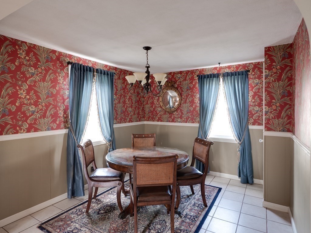 357 Massachusetts Avenue West Springfield, MA 01089 - Photo 5 of 22 a view of a dining room with furniture and window