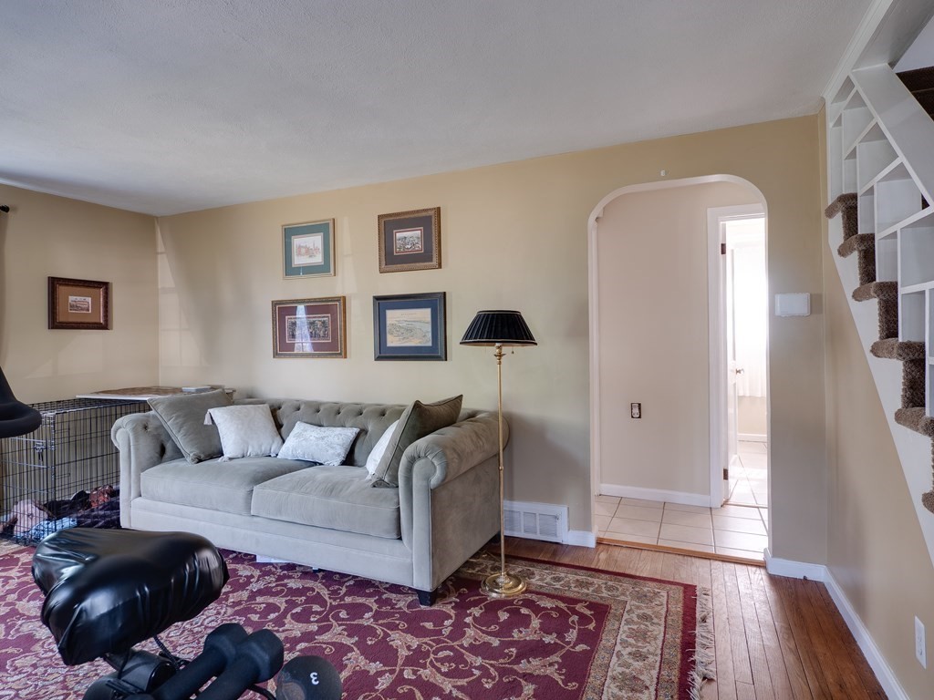 357 Massachusetts Avenue West Springfield, MA 01089 - Photo 8 of 22 a living room with furniture and wooden floor