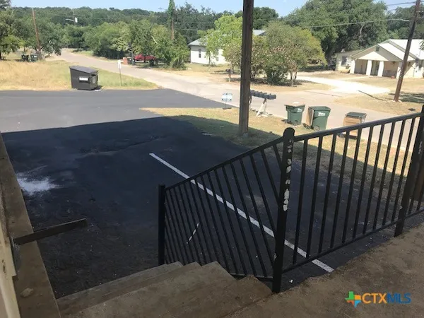 a view of a balcony with an outdoor space