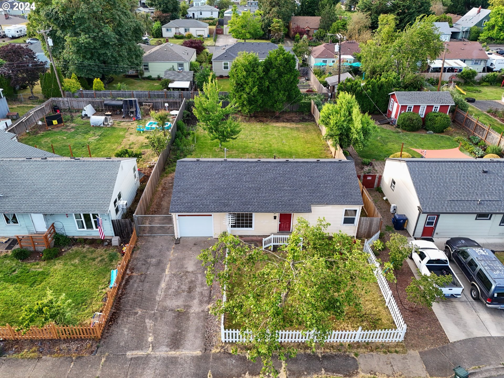 1534 A Street Springfield, OR 97477 - Photo 23 of 24 an aerial view of multiple houses with yard