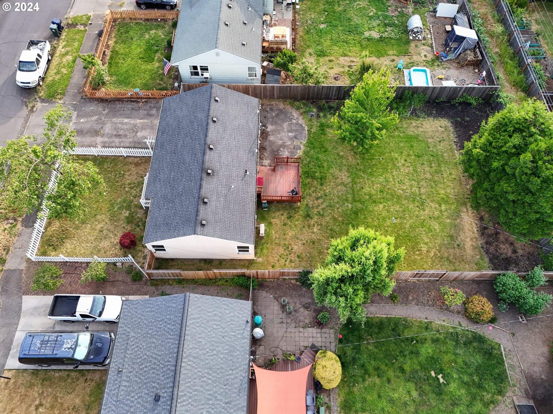 1534 A Street Springfield, OR 97477 - Photo 24 of 24 an aerial view of a house with garden space and a lake view in back