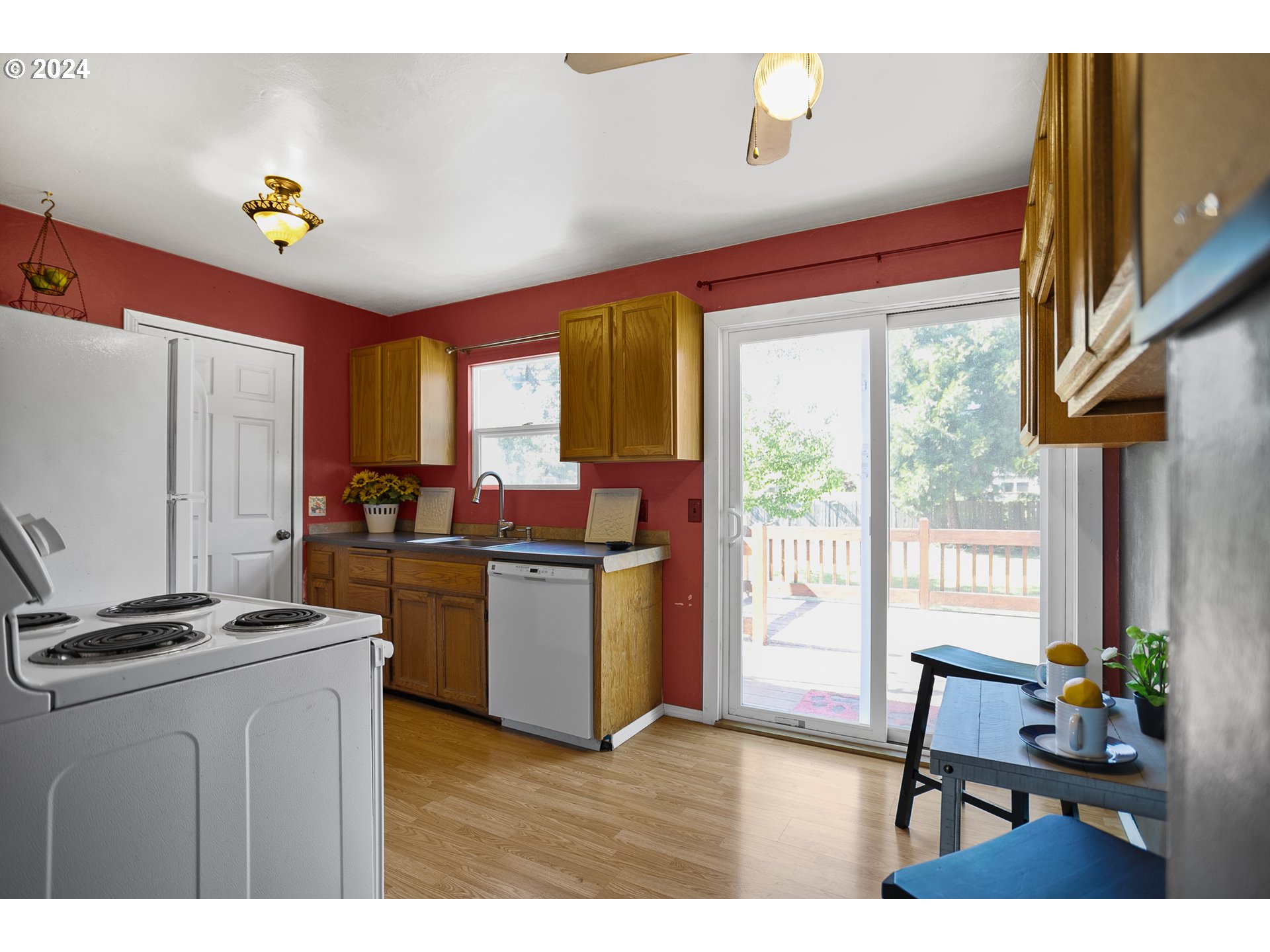 1534 A Street Springfield, OR 97477 - Photo 8 of 24 a kitchen with sink refrigerator and window