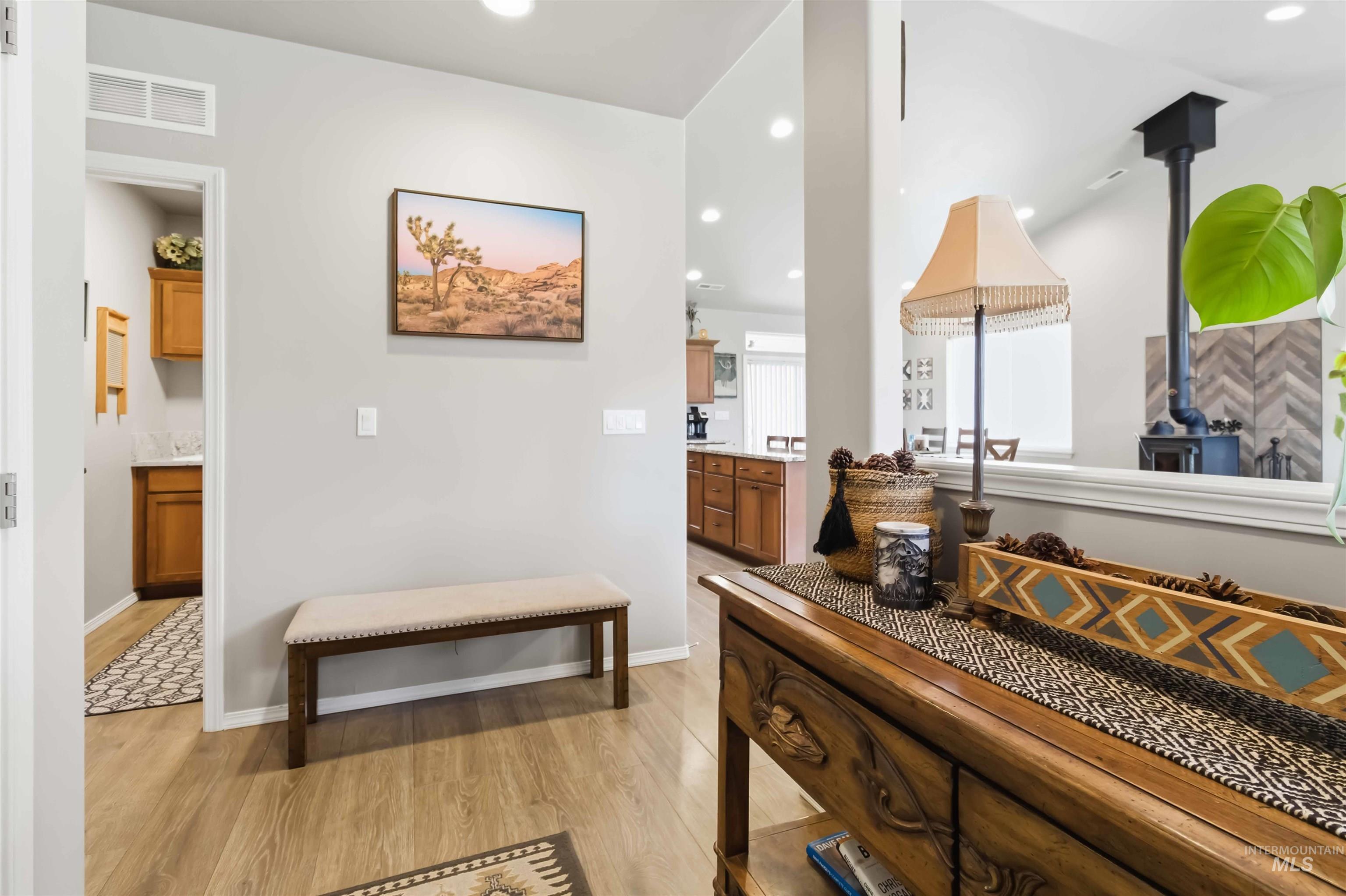 25 River Ridge Horseshoe Bend, ID 83629 - Photo 16 of 50 Hallway featuring light wood-type flooring and recessed lighting