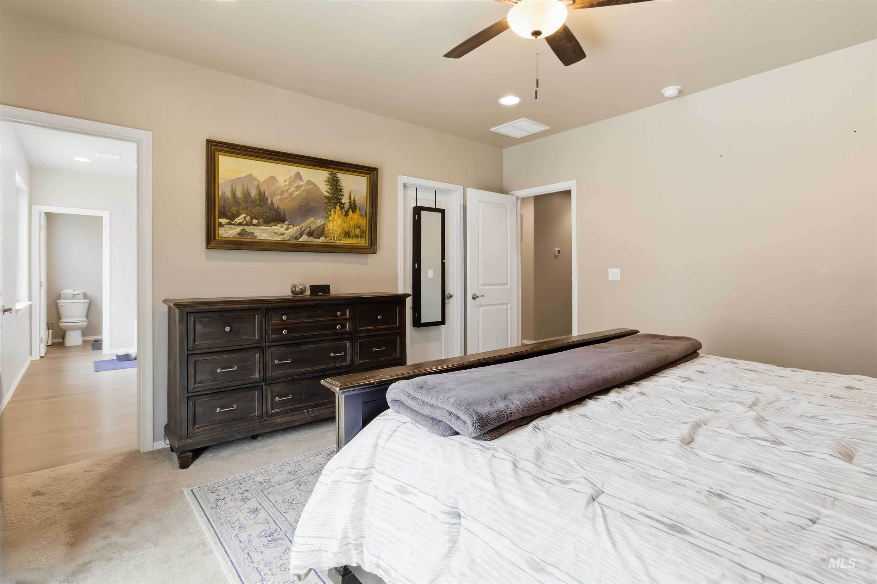 25 River Ridge Horseshoe Bend, ID 83629 - Photo 27 of 50 Bedroom featuring light carpet and ceiling fan