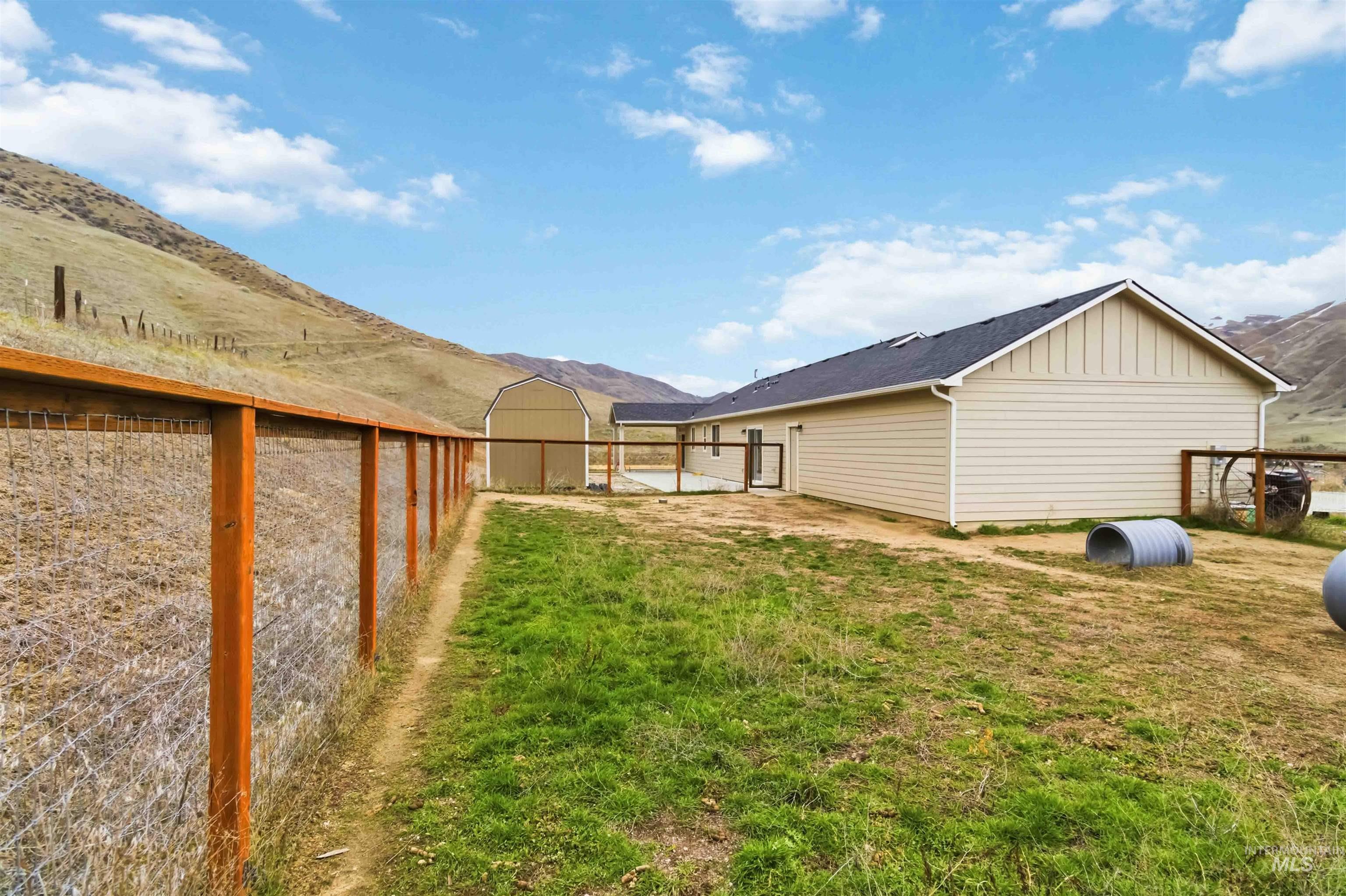 25 River Ridge Horseshoe Bend, ID 83629 - Photo 41 of 50 View of yard featuring a mountain view and a gate