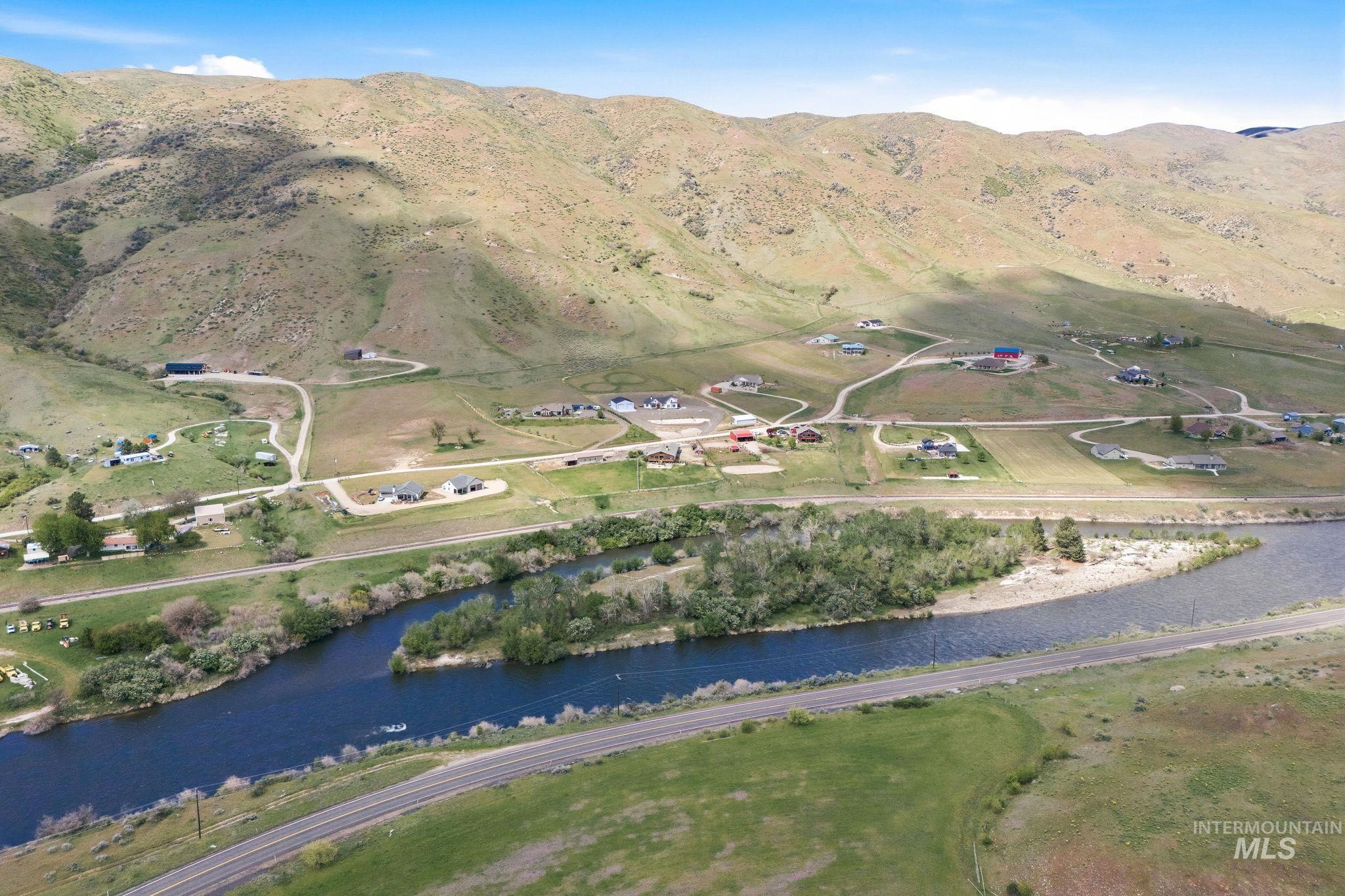 25 River Ridge Horseshoe Bend, ID 83629 - Photo 5 of 50 Riverfront property featuring a winding river, verdant hillsides, and expansive surrounding terrain
