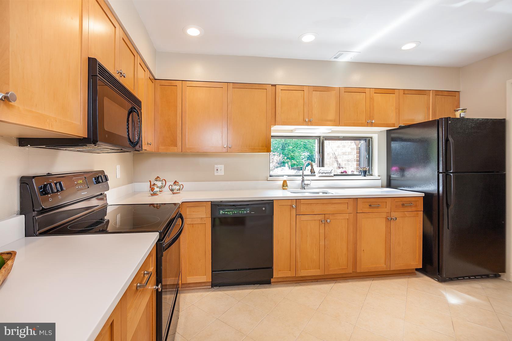 11600 Hunters Green Court Reston, VA 20191 - Photo 17 of 24 Granite in Kitchen, ceramic floors