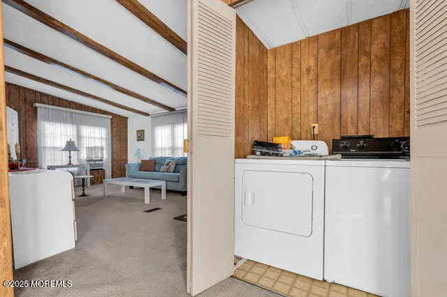 a view of kitchen with furniture and window