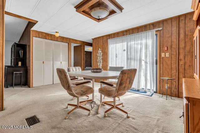 a view of a livingroom with furniture and window
