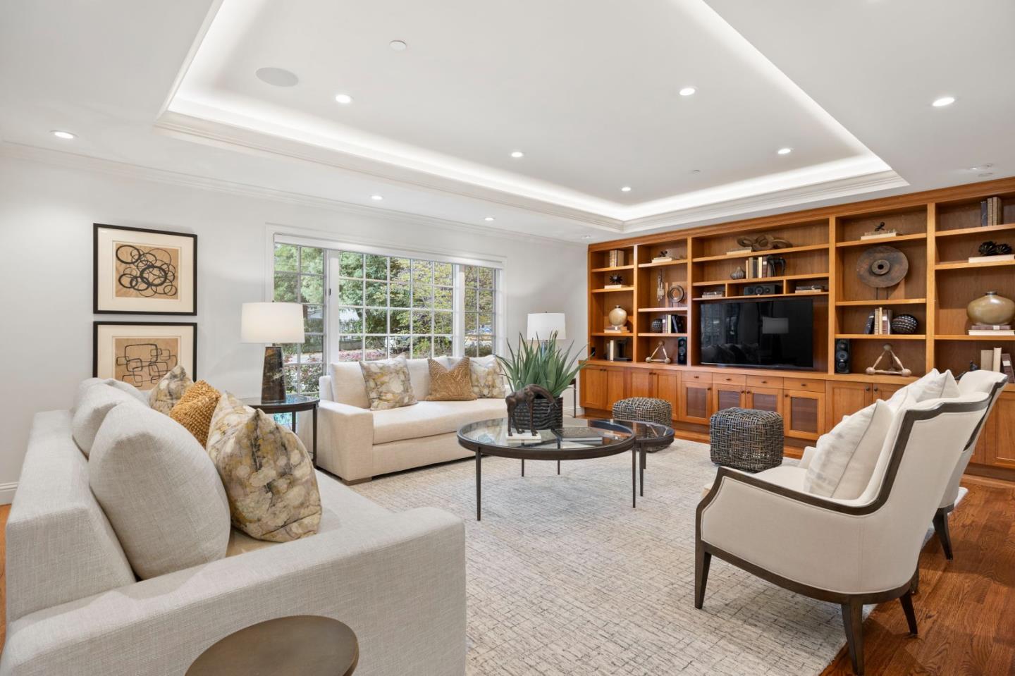 310 Ranelagh Road Hillsborough, CA 94010 - Photo 20 of 51 a living room with furniture and a large window