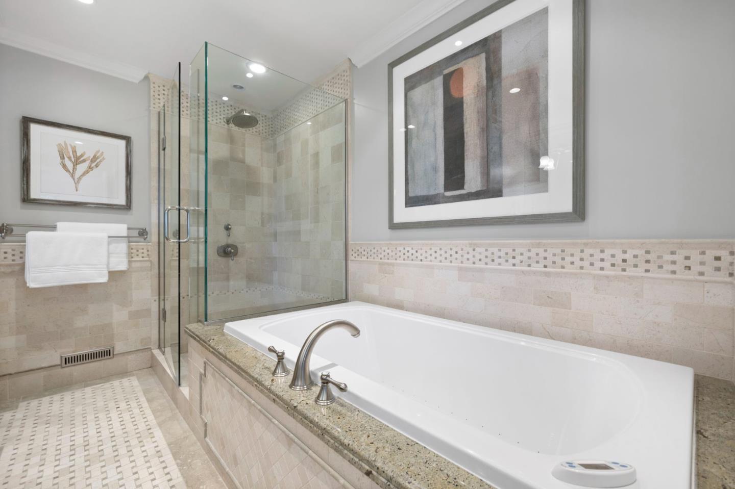 310 Ranelagh Road Hillsborough, CA 94010 - Photo 28 of 51 a bathroom with a bathtub and a shower