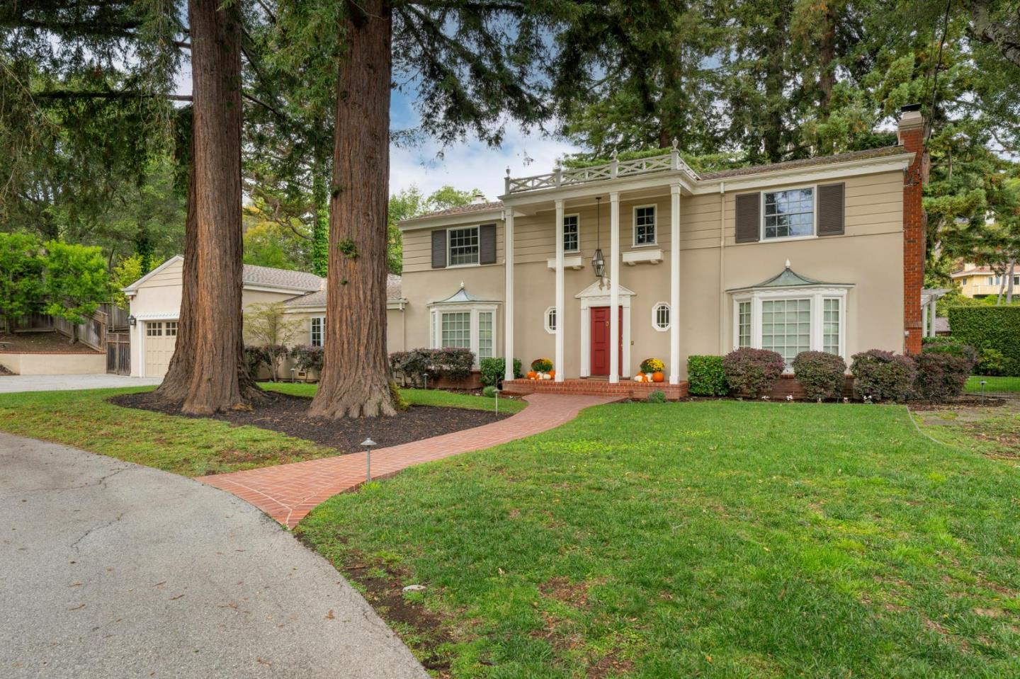 310 Ranelagh Road Hillsborough, CA 94010 - Photo 3 of 51 front view of a house with a yard