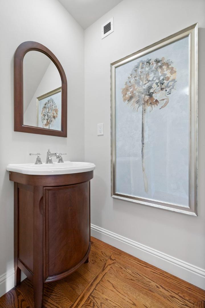 310 Ranelagh Road Hillsborough, CA 94010 - Photo 43 of 51 a bathroom with a sink and a mirror