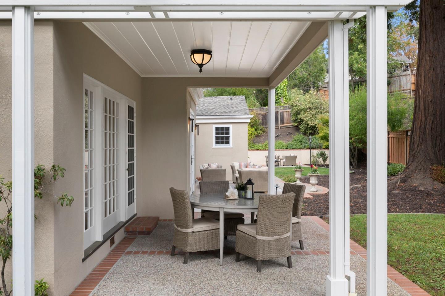 310 Ranelagh Road Hillsborough, CA 94010 - Photo 48 of 51 a dining room with furniture and windows
