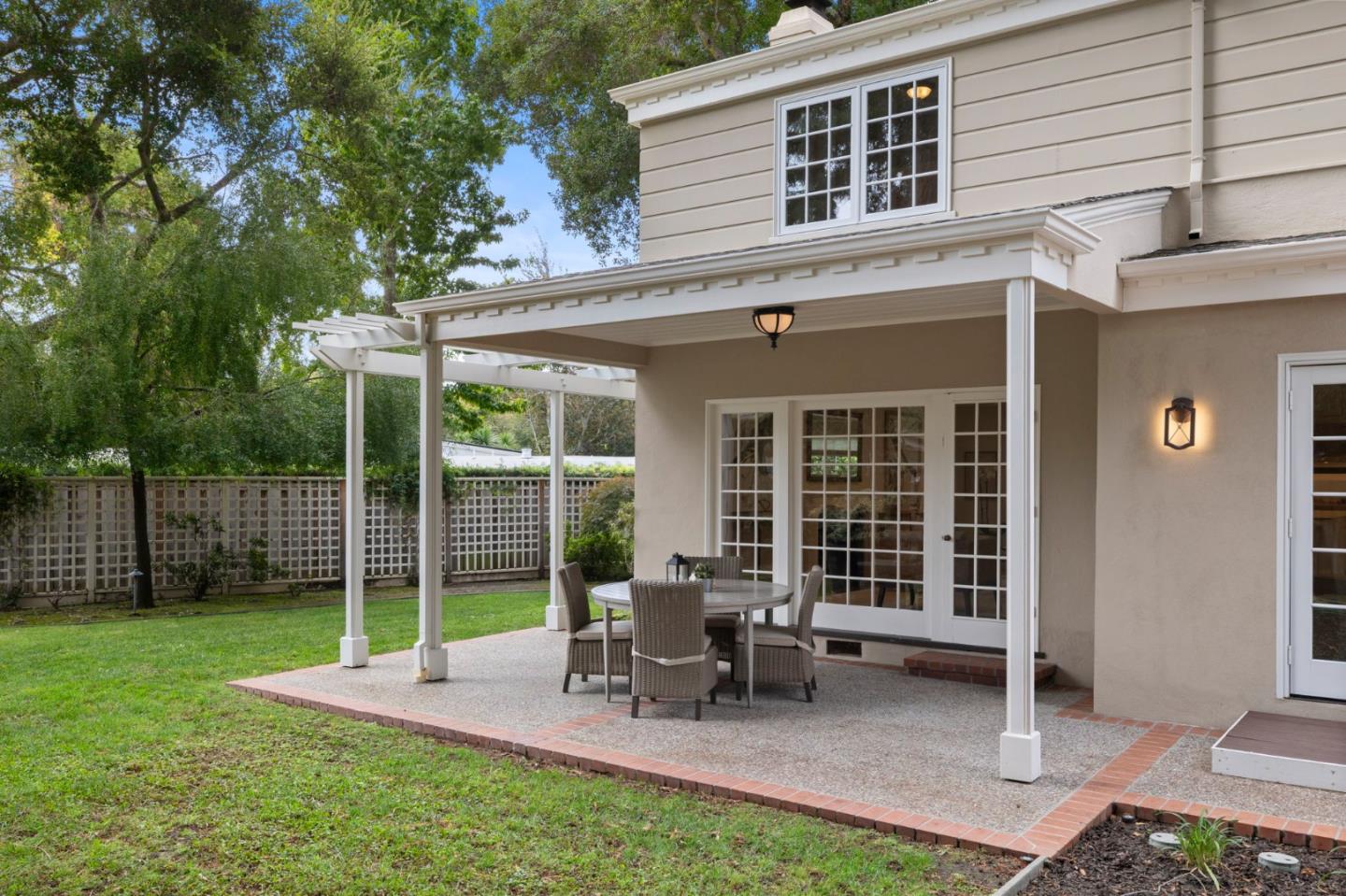 310 Ranelagh Road Hillsborough, CA 94010 - Photo 50 of 51 a backyard of a house with outdoor seating