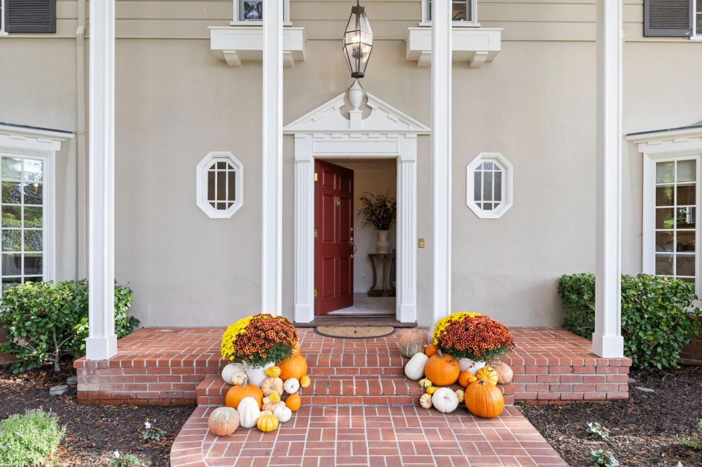 310 Ranelagh Road Hillsborough, CA 94010 - Photo 5 of 51 a front view of a house with patio