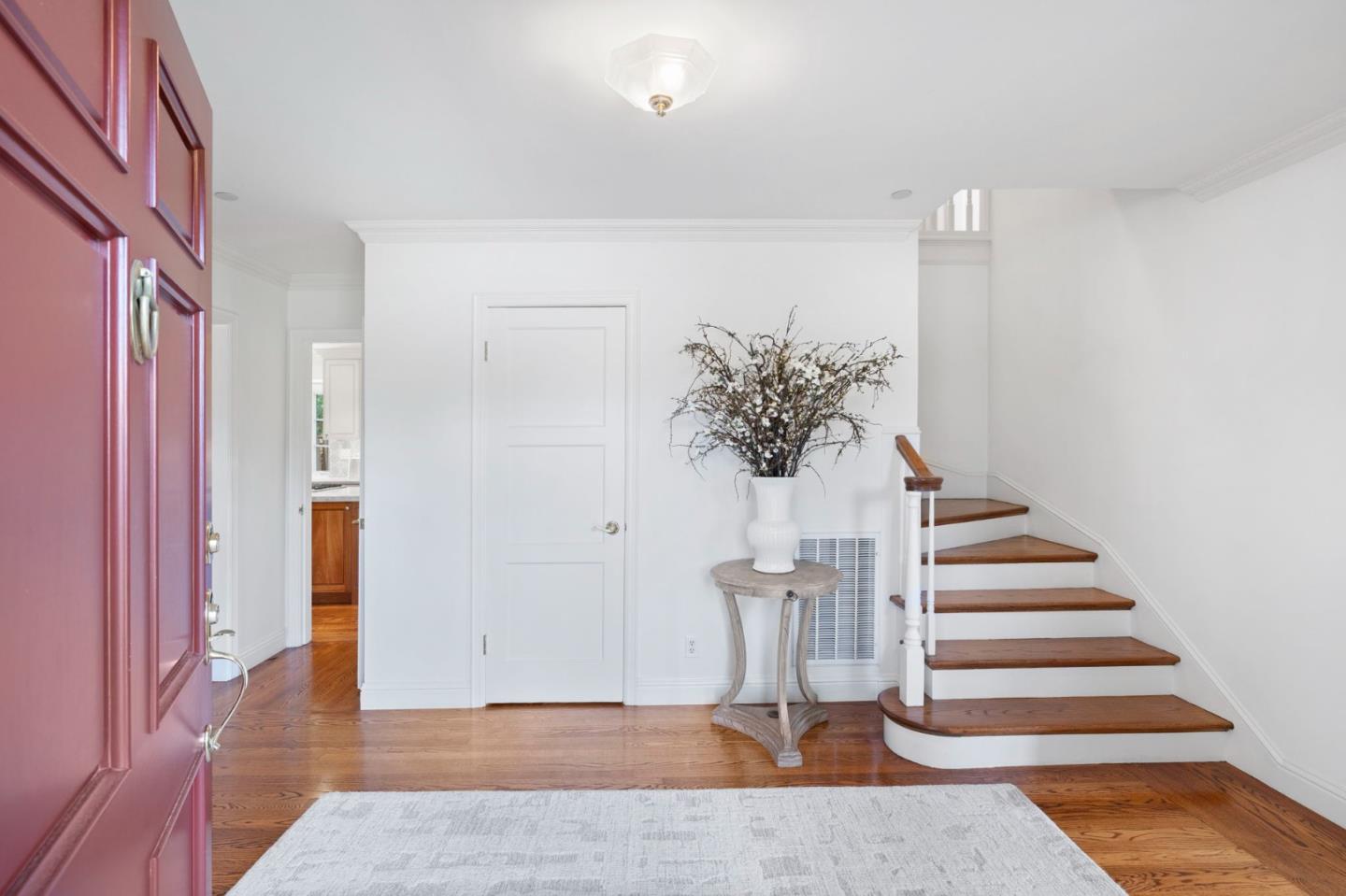 310 Ranelagh Road Hillsborough, CA 94010 - Photo 6 of 51 a view of entryway and hall with wooden floor