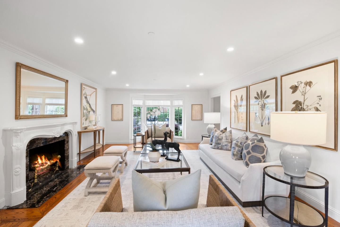310 Ranelagh Road Hillsborough, CA 94010 - Photo 8 of 51 a living room with furniture large window and a fireplace