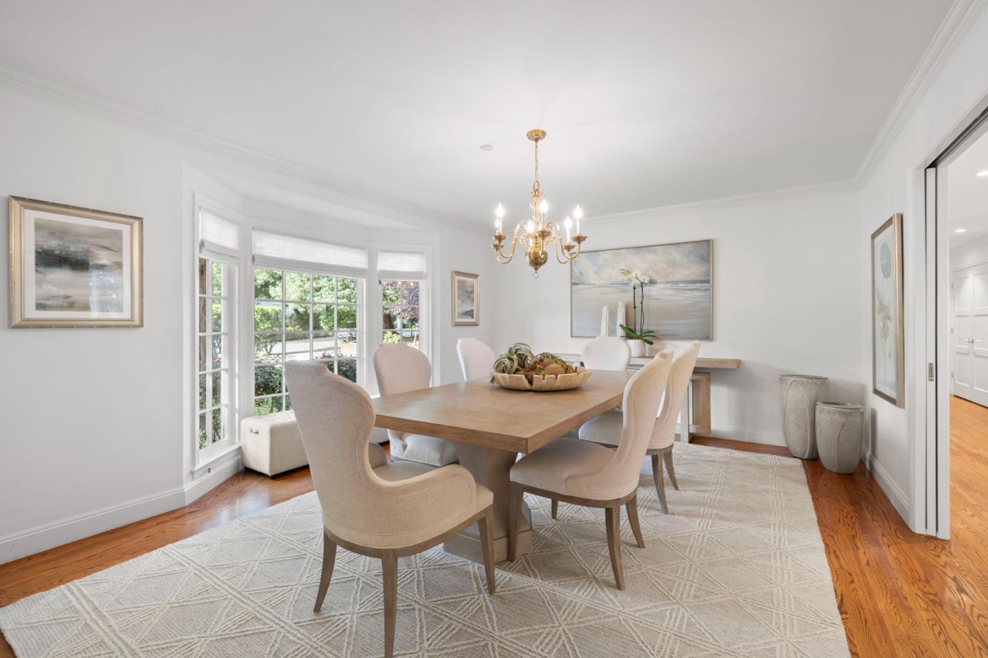 310 Ranelagh Road Hillsborough, CA 94010 - Photo 10 of 51 a view of a dining room with furniture window and wooden floor