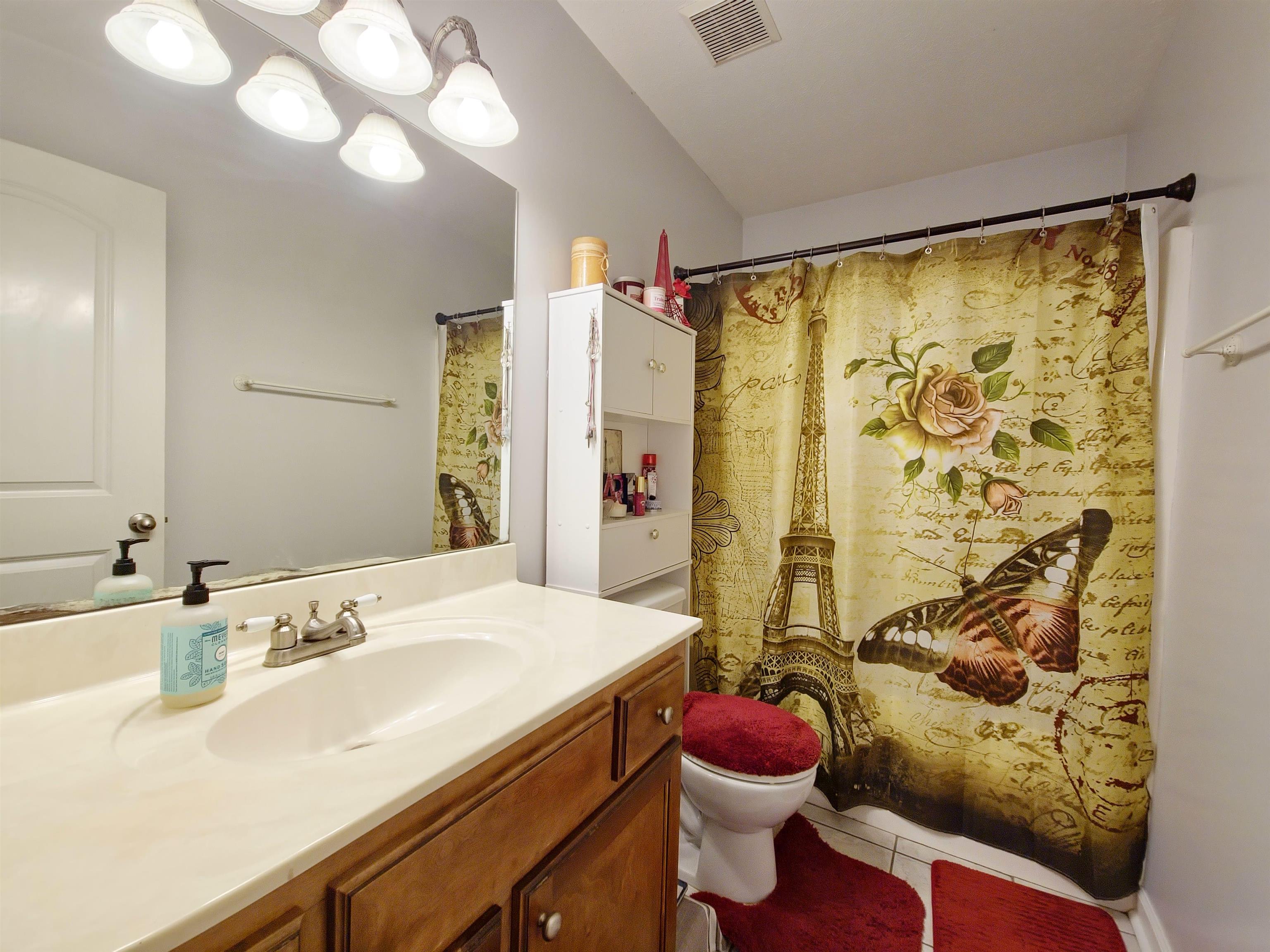 313 Rembert Drive Atoka, TN 38004 - Photo 9 of 19 Bathroom with vanity, tile patterned flooring, and toilet
