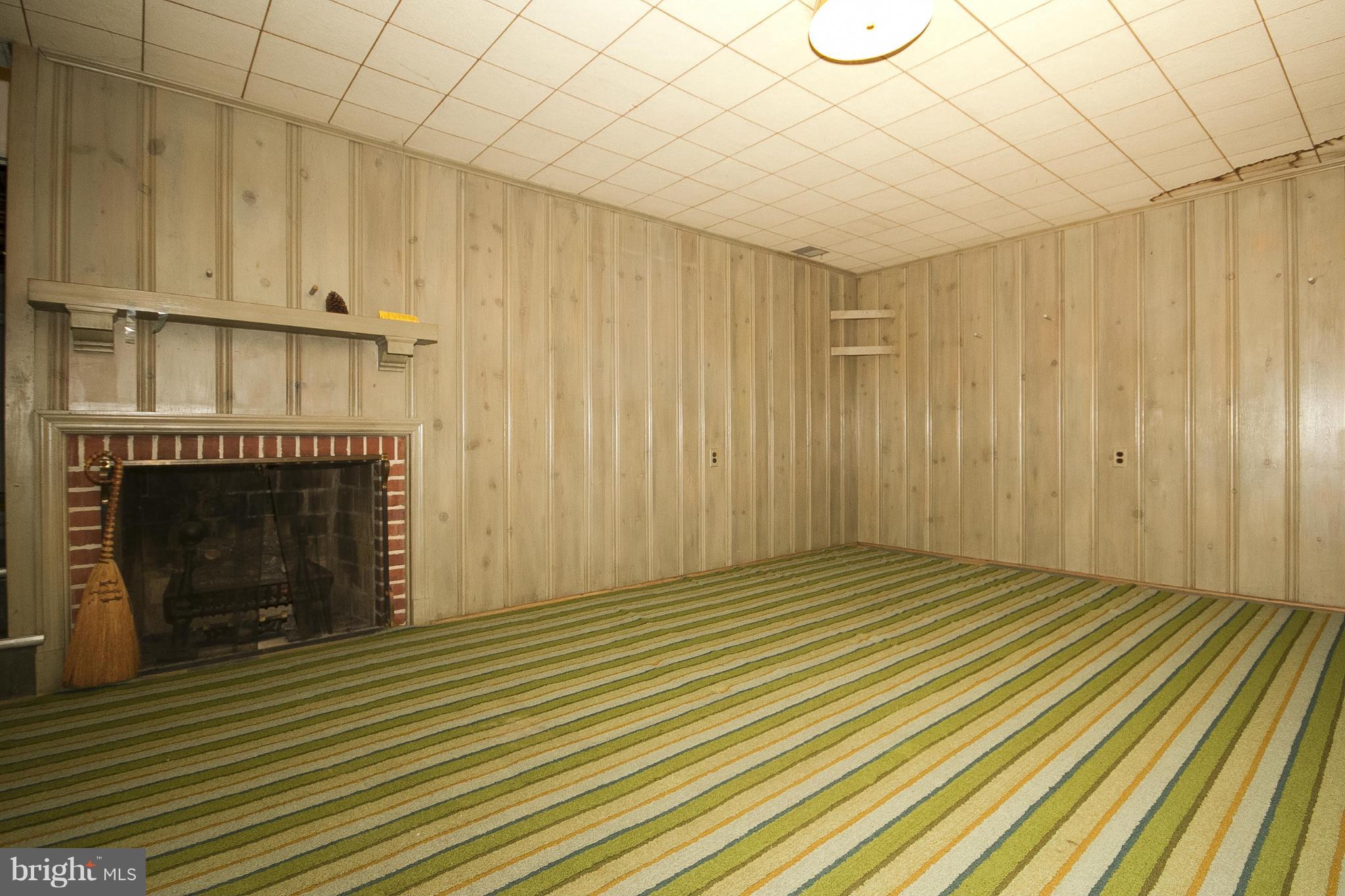 417 Aigburth Road Baltimore, MD 21286 - Photo 21 of 24 Lower level Family Room w/ fireplace