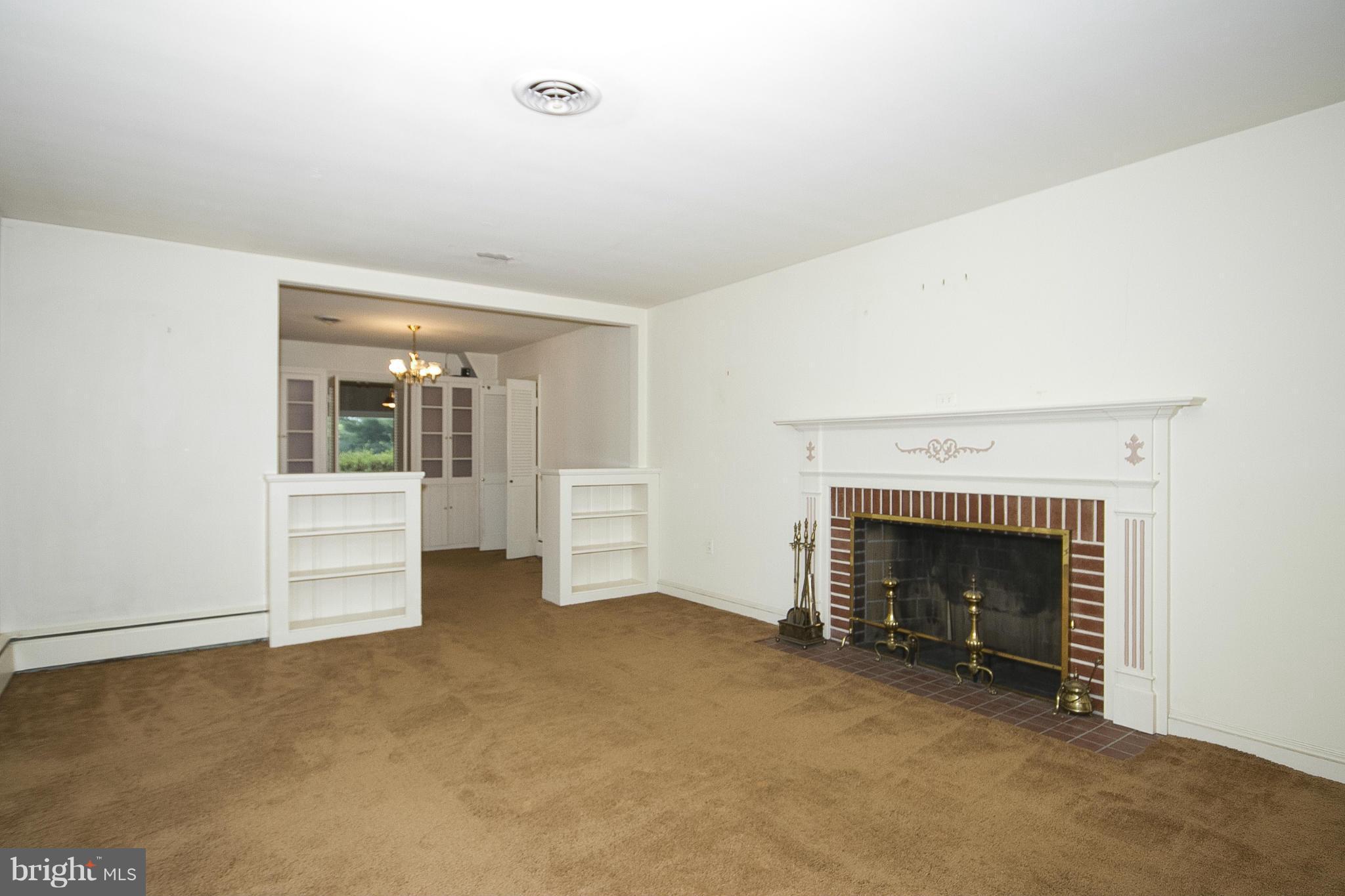 417 Aigburth Road Baltimore, MD 21286 - Photo 6 of 24 Living Room w/ wood burning fireplace