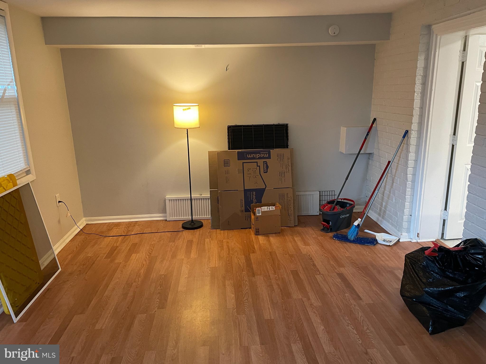 2307 Wyngate Road Suitland, MD 20746 - Photo 8 of 22 a view of a room with wooden floor and a window