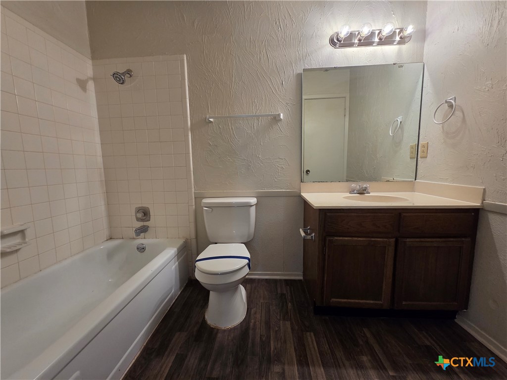 1802 Azalea Drive Temple, TX 76502 - Photo 12 of 21 a bathroom with a sink a toilet and shower