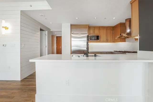a spacious bathroom with a double vanity sink mirror and toilet