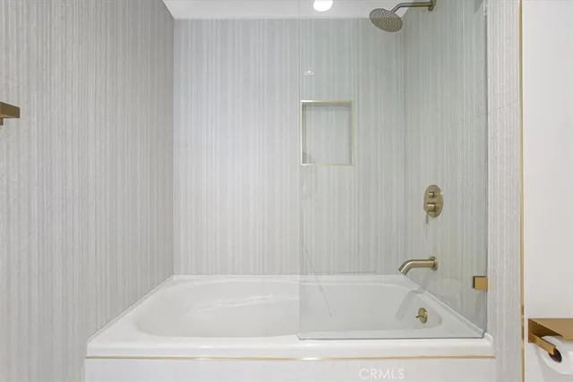 a view of a balcony with a yard