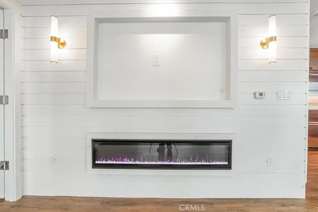 a kitchen with granite countertop cabinets and window